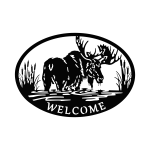 A black, laser-cut steel wall sign featuring a moose standing in water, surrounded by cattails within an oval frame. The word 'Welcome' is cut out below the moose. The intricate details of the moose and cattails are highlighted by the precision of the cut, creating a rustic and nature-inspired look suitable for home or cabin decor.